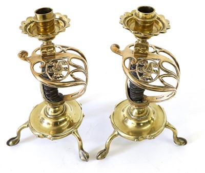 Lot 87 - A Pair of Decorative Brass Candlesticks, each...