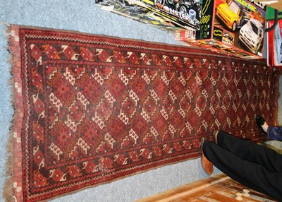 Lot 845 - Red ground Persian runner