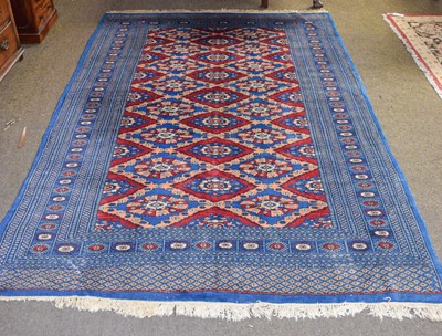 Lot 1285 - A "Bukhara" Rug, the blood red diamond lattice...