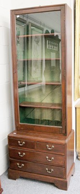 Lot 1151 - A Georgian Style Bookcase, with glazed upper...