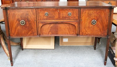 Lot 1271 - A Crossbanded Mahogany Concave Sideboard, on...