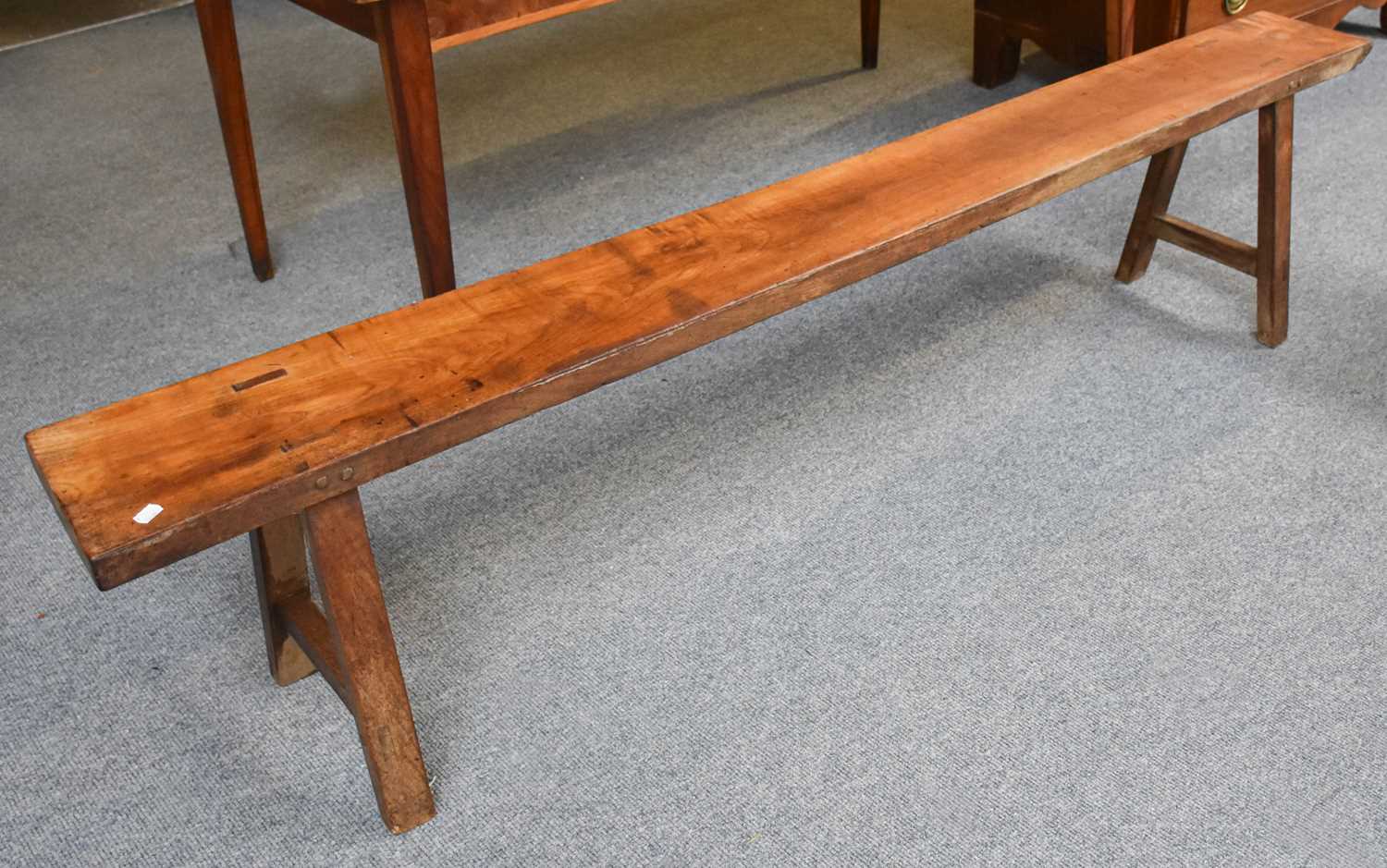 Lot 1338 - A French Cherrywood Bench, 200cm long, seat...