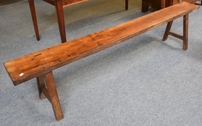 Lot 1338 - A French Cherrywood Bench, 200cm long, seat...