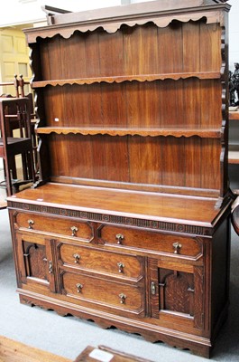 Lot 1244 - A 20th Century Oak Dresser and Rack, with...