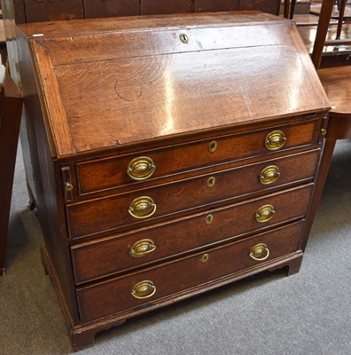 Lot 1249 - A Georgian Oak Bureau, 100cm by 50cm by 103cm