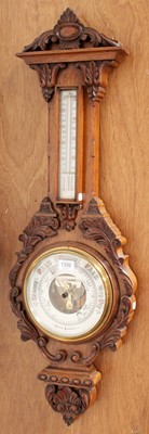 Lot 1332 - A Late Victorian Carved Oak Aneroid Barometer,...