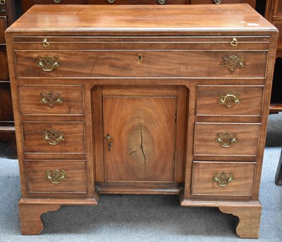 Lot 1294 - An Early 19th century Mahogany Knee Hole Desk,...