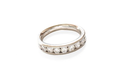 Lot 205 - A Platinum Diamond Half Hoop Ring, nine round...