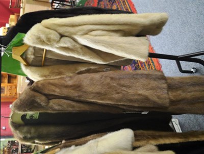 Lot 889 - White mink fur jacket, Marcus Ltd brown fur coat, mink fur hat and one other (4)