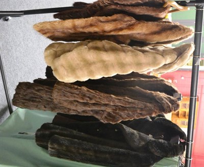 Lot 896 - Astrakhan faux fur jacket, another, three stoles and a squirrel fur coat, and a Jekmoth...