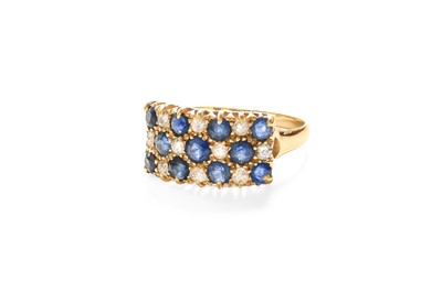 Lot 286 - An 18 Carat Gold Sapphire and Diamond Cluster...