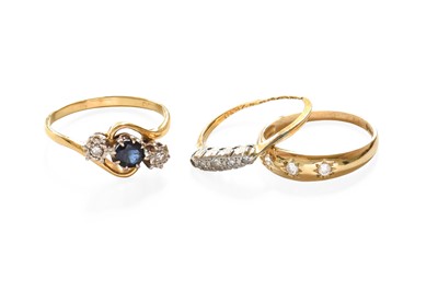 Lot 285 - An 18 Carat Gold Sapphire and Diamond Three...