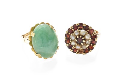 Lot 257 - A 9 Carat Gold Jade Ring, the oval cabochon...