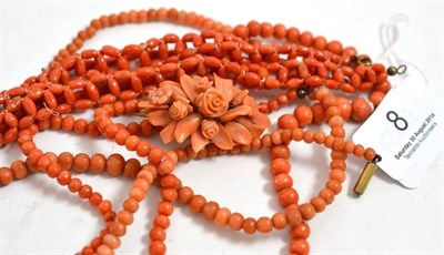 Lot 8 - A rose carved coral brooch, two coral necklaces and two bracelets