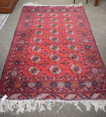 Lot 1287 - Afghan Tekke Rug, the blood red field with...