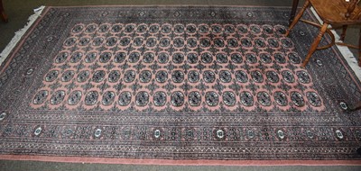 Lot 1281 - A Lahore Bukhara Rug, the pale terracotta...