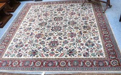 Lot 1118 - A Machine-Made Carpet of Oriental Design, the...