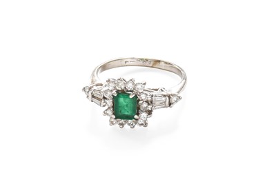 Lot 291 - An Emerald and Diamond Cluster Ring, the...