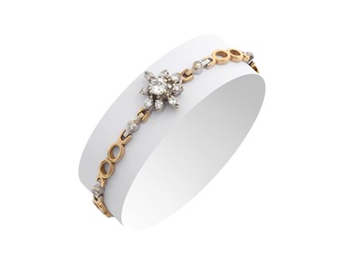 Lot 2151 - A 9 Carat Gold Diamond Bracelet the central...