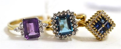Lot 21 - A 9ct gold amethyst and diamond ring, a 9ct gold blue topaz and diamond cluster ring and a 9ct gold