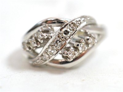 Lot 24 - An 18ct white gold diamond set ring