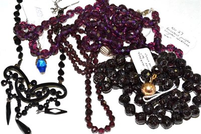 Lot 33 - Three faceted bead necklaces, a black necklace - possibly French jet on steel, and a 1930's pendant