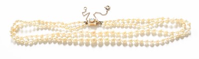 Lot 351 - A Two Row Cultured Pearl Necklace, knotted to...