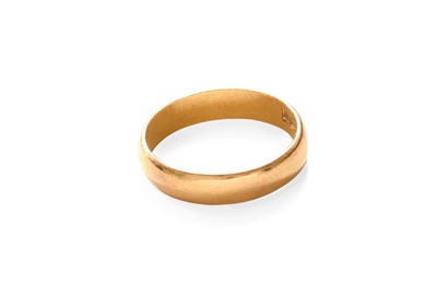 Lot 318 - A 22 Carat Gold Band Ring, finger size J