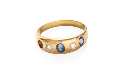 Lot 317 - A Sapphire and Diamond Five Stone Ring, the...