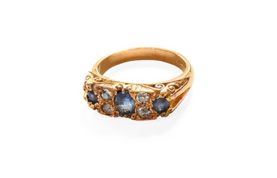 Lot 314 - An 18 Carat Gold Sapphire and Diamond Ring,...