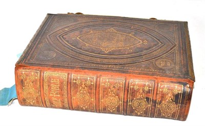 Lot 72 - Leather bound bible with brass clasp