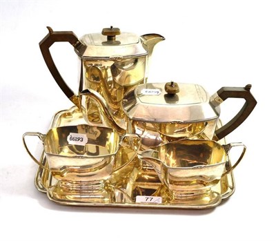 Lot 77 - Silver four piece tea service and tray