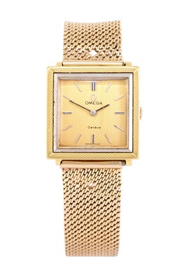 Lot 2403 - Omega: An 18 Carat Gold Wristwatch, signed...