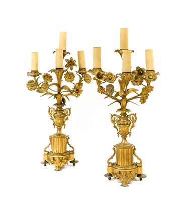 Lot 413 - A Pair of Gilt Metal Four-Light Candelabra, in...