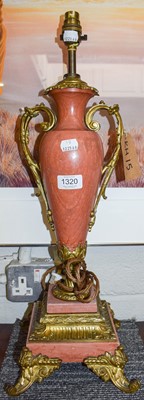 Lot 1320 - A Pink Marble and Gilt Metal Mounted...