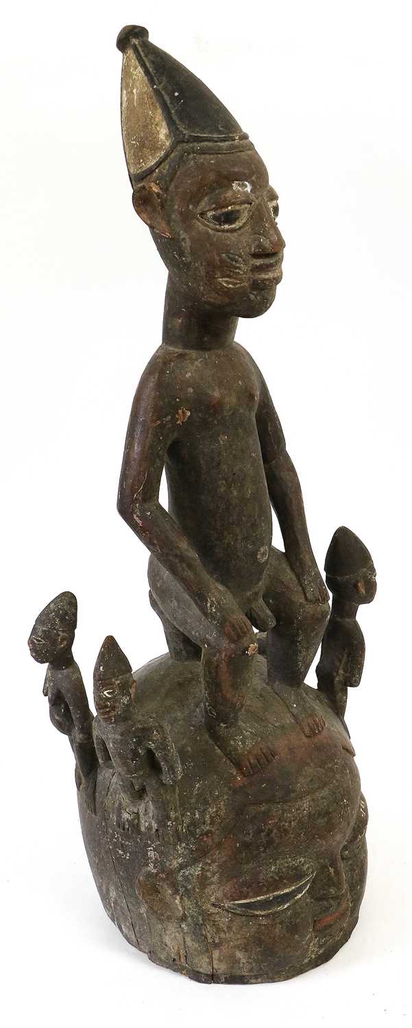 Lot 166 - A Yoruba Epa Helmet Mask, Nigeria, the base...