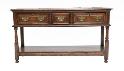 Lot 274 - A 17th Century-Style Oak Dresser, the moulded...