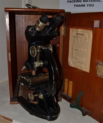 Lot 96 - A cased microscope signed Prior, London