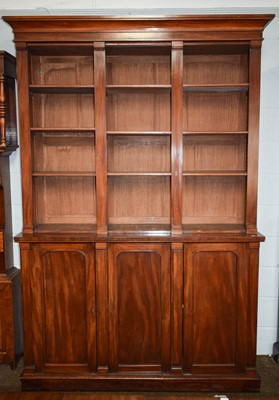 Lot 1379 - A 19th century Mahogany Triple Open Bookcase,...