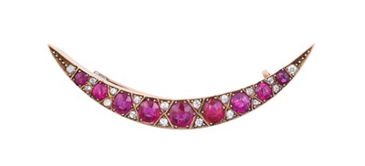 Lot 2142 - A Victorian Ruby and Diamond Crescent Brooch...