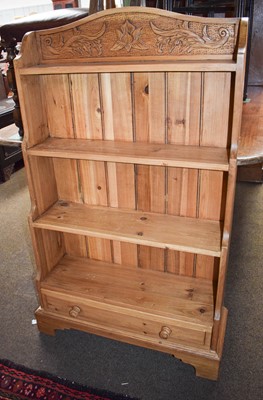 Lot 1402 - A 20th Century Carved Pine Waterfall Bookcase,...