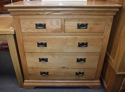 Lot 1399 - A Modern Oak Four Height Straight Front Chest...