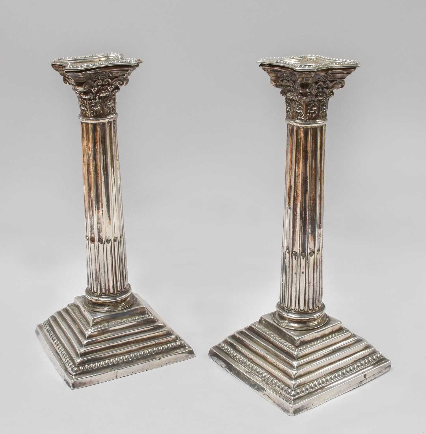 Lot 21 - A Pair of Edward VII Silver Candlesticks, by...