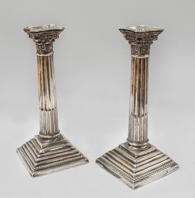 Lot 21 - A Pair of Edward VII Silver Candlesticks,...