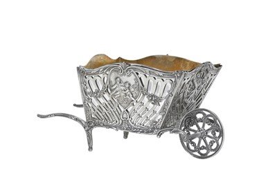 Lot 2054 - A German Silver Small Jardinière in the Form of a Wheelbarrow
