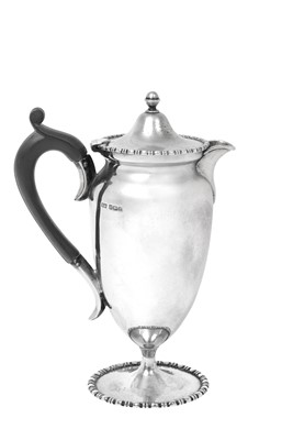 Lot 224 - An Edward VII Silver Hot-Water Jug