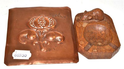 Lot 126 - A Robert ";Mouseman"; Thompson oak ashtray and an Arts & Crafts copper panel