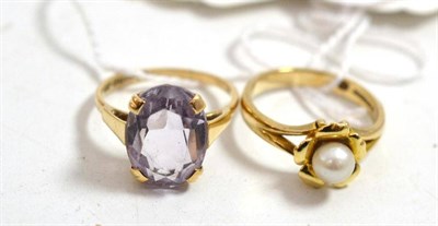 Lot 132 - An 9ct gold amethyst ring and a 9ct gold cultured pearl ring (2)