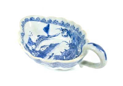 Lot 181 - ~ A Chinese Porcelain Double-Lipped Sauceboat,...