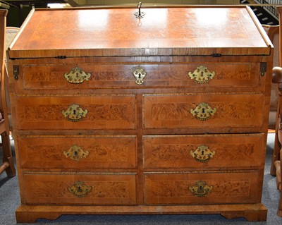 Lot 1472 - A Continental Cross-Banded Burr Walnut Bureau,...